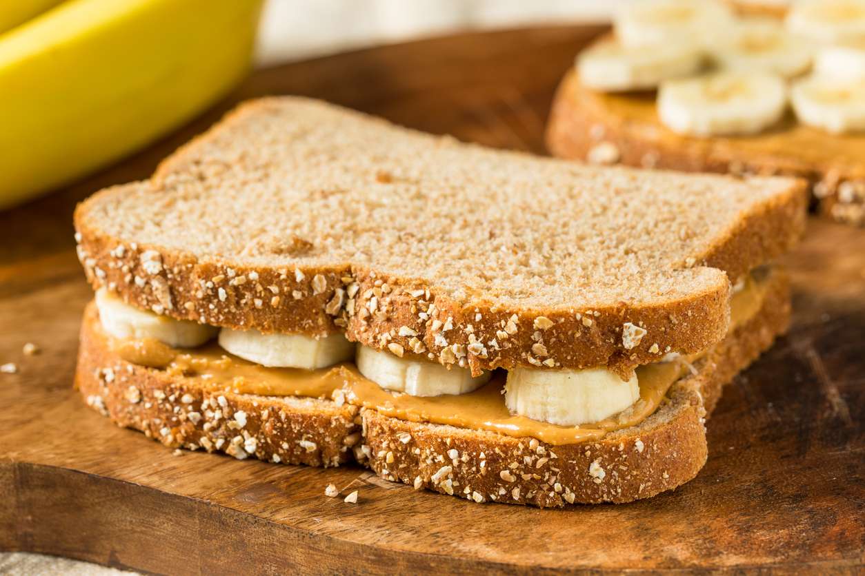 peanut butter and banana sandwich on whole wheat bread